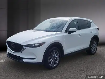 Le Mazda CX-5 GS AWD 2021 est un VUS compact alliant performance, confort et technologies avancées....