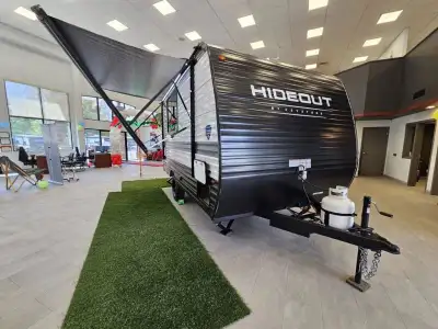 Keystone Hideout Sport Single Axle travel trailer 140RE highlights: Queen Bed 3.3 Cu. Ft. 12V Refrig...