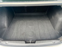 This 2013 Chevrolet Cruze has a Grey exterior and Grey seats with seating for 5. Equipped with a 1.4... (image 6)