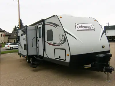 2 Slides, Sleeps 10 which includes 2 Large Bunks and 2 Entrances, one into the bathroom! Call Dealer...