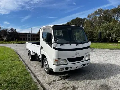 2004 Toyota Toyoace Flat Deck Right Hand Drive, 4 cylinder, white exterior, grey interior, cloth. Th...
