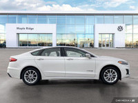 This Ford Fusion Hybrid boasts a Gas/Electric I-4 2.0 L/122 engine powering this Variable transmissi... (image 5)
