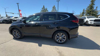 This Honda CR-V is equipped with: Leatherette/Fabric Seating Surfaces, Power moonroof, Heated front... (image 5)