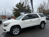 This 2014 GMC Acadia SLE-2 is a spacious and reliable SUV with a sleek white exterior and a comforta... (image 1)