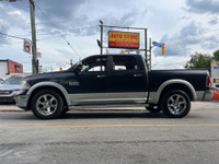 2014 Ram 1500 4WD Crew Cab Laramie Loaded with luxury and power, this full-size pickup features prem... (image 8)