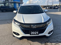Elevate your driving experience with the striking White Honda HR-V Sport, featuring an All-Wheel Dri... (image 5)