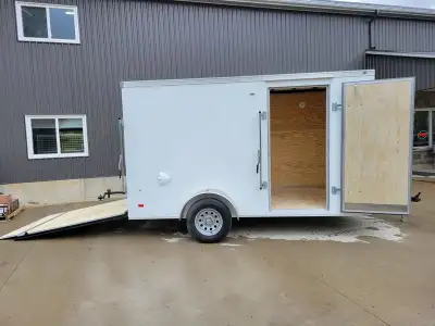 6X12 Haul-About Panther Enclosed Trailer Features: Coated Steel Frame 6'x12' plus V-nose 6.5' interi...