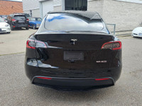 Unleash instant torque and futuristic performance with this 2023 Tesla Model Y Performance—solid bla... (image 4)