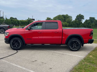 WAS: $64879 NOW: $59998 plus taxes and licensing feesConquer the Road with the 2021 Ram 1500 Rebel:... (image 1)
