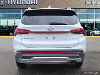 Experience the 2023 Hyundai Santa Fe Preferred SUV, boasting a stunning Quartz White exterior and bl... (image 3)