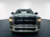 The 2020 Ram 2500 Big Horn in a classic white exterior and rugged 4x4 drivetrain promises unparallel... (image 7)