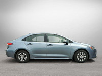 This Toyota Corolla boasts a Gas/Electric I-4 1.8 L/110 engine powering this Variable transmission.... (image 3)