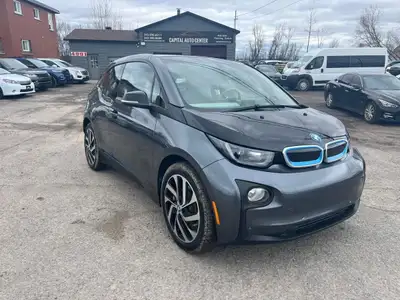 The 2017 BMW i3 is a pioneering electric vehicle that seamlessly blends innovative design, sustainab...