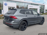 This Volkswagen Tiguan boasts a Intercooled Turbo Regular Unleaded I-4 2.0 L/121 engine powering thi... (image 4)