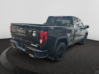 This 2025 GMC Sierra 1500 in Onyx Black is equipped with 4WD and Turbocharged Diesel I6 3.0L/183 eng... (image 4)