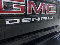 The 2025 GMC Canyon Denali Black Edition in Onyx Black is a premium and sophisticated mid-size picku... (image 6)