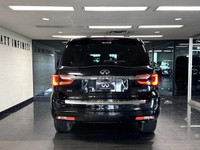 The 2024 Infiniti QX80 Luxe is a powerful and refined SUV, driven by a 5.6L premium engine that deli... (image 3)