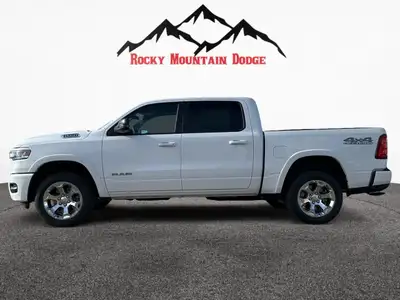 The 2025 Ram 1500 Big Horn 4x4 Crew Cab in pristine white is the ultimate tool for those who demand...