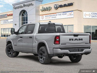 This Ram 1500 boasts a Gas/Electric V-6 3.6 L/220 engine powering this Automatic transmission. Cruis... (image 4)