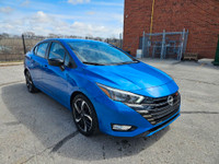 Buckle up, because this 2023 Nissan Versa SR CVT in Electric Blue Metallic isnt just a carits your t... (image 8)