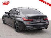This sleek 2021 BMW 3 Series 330i xDrive M SPORT is a real head-turner! With its stylish black exter... (image 3)