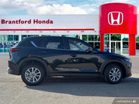 Experience the confident handling and sleek style of this 2024 Mazda CX-5 GS. Boasting a low 35,730k... (image 6)