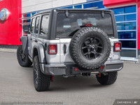This Jeep Wrangler has a trusty Intercooled Turbo Premium Unleaded I-4 2.0 L/122 engine powering thi... (image 5)