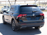 Rare Tiguan with 3 rows of seating and a sharp looking blue interior! WE ARE A NO PRESSURE ENVIRONME... (image 7)