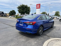 Experience the thrill of effortless driving with this 2022 Honda Civic Sedan Touring, boasting a sle... (image 4)
