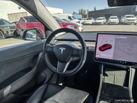 This Tesla Model Y delivers a Electric engine powering this Automatic transmission. Window Grid Ante... (image 8)