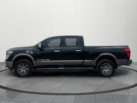 Here’s your chance to own a one-of-a-kind 2018 Nissan Titan XD Platinum Reserve with the powerful an... (image 2)