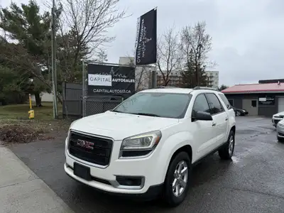 This 2014 GMC Acadia SLE-2 is a spacious and reliable SUV with a sleek white exterior and a comforta...