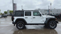 This 2025 JEEP WRANGLER 4-DOOR RUBICON has the following options Cloth Low-Back Bucket Seats, Remote... (image 5)
