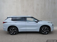 This Outlander features heated rear seats, a panoramic sun/moonroof, and a 3rd row seat. Advanced sa... (image 6)
