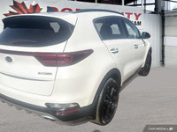 This Kia Sportage delivers a Intercooled Turbo Regular Unleaded I-4 2.0 L/122 engine powering this A... (image 5)