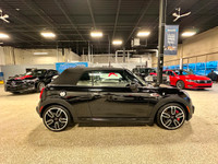 Enjoy a luxurious open-air joyride with our 2020 MINI Cooper Convertible John Cooper Works presented... (image 5)