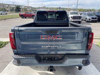 The 2025 GMC Sierra 3500 Denali in Downpour Metallic is a luxurious and capable heavy-duty pickup tr... (image 6)