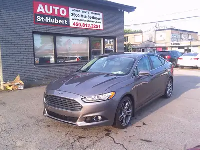 Ford Fusion Titanium AWD 2013Kilométrage : 136 891 kmTransmission : AutomatiqueMotorisation : 4 cyli...