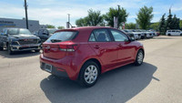 This Kia Rio is equipped with: Cloth, 6 Speakers, Cloth Seat Trim, Heated front seats, Radio: AM/FM/... (image 4)