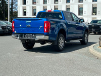 This 2019 Ford Ranger Lariat has a Lightning Blue Exterior and Ebony Leather Interior with seating f... (image 7)