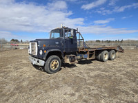 Ford T/A Day Cab Flat Deck Truck 9000