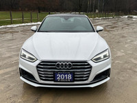 Elevate your driving experience with the 2018 Audi A5 Technik S-Line, a stunning combination of soph... (image 9)