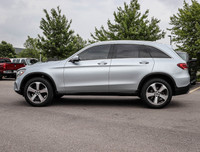 The 2022 Mercedes-Benz GLC 300 4MATIC SUV in sleek silver is the ultimate combination of luxury and... (image 4)