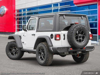 This Jeep Wrangler has a strong Intercooled Turbo Premium Unleaded I-4 2.0 L/122 engine powering thi... (image 5)
