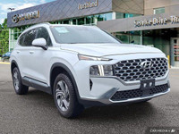 Experience the 2023 Hyundai Santa Fe Preferred SUV, boasting a stunning Quartz White exterior and bl... (image 6)