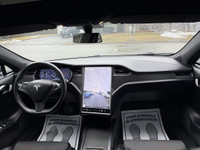 This sleek 2018 Tesla Model S in black is a stylish and eco-friendly choice for your next ride. With... (image 8)
