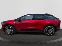 This 2025 Cadillac OPTIQ in Radiant Red Tintcoat is equipped with AWD and Electric engine. Check out... (image 1)