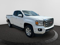 The GMC Canyon can carry up to 1620 pounds of people or cargo, and tow up to 7,000 pounds. White in... (image 6)