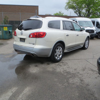 This 2010 Buick Enclave is a stylish and reliable SUV with plenty of room for your family and advent... (image 5)