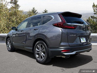 This sleek 2021 Honda CR-V Sport SUV, boasting a stunning Modern Steel Metallic exterior and only 33... (image 3)